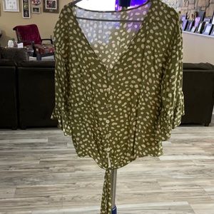Green polka dot tie blouse